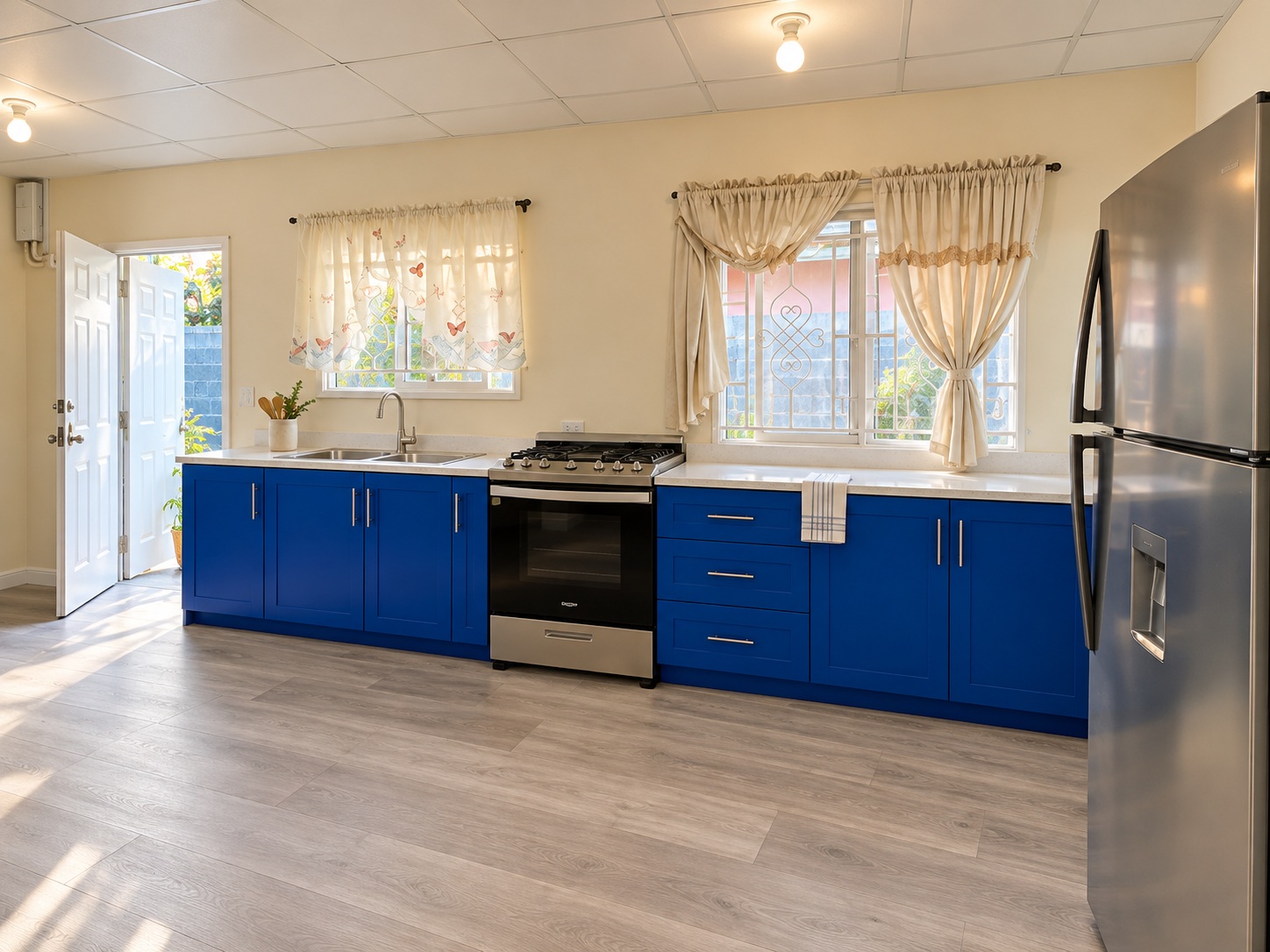 Blue cabinet fronts with silver bar handles