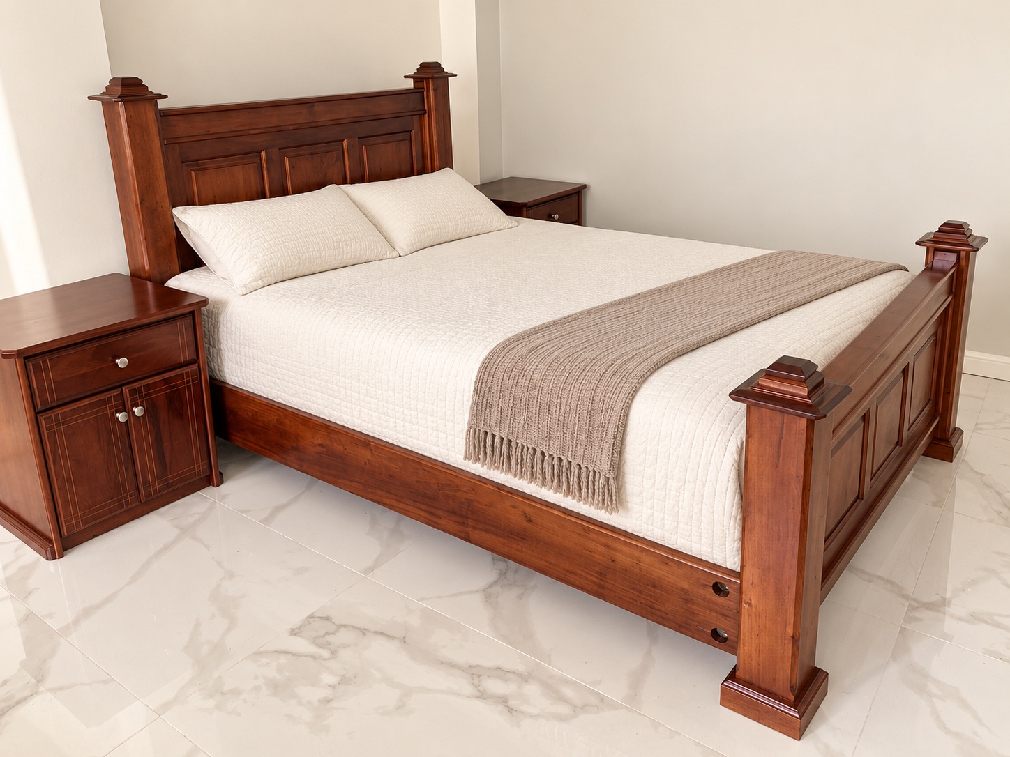 A paneled bed with stepped posts and matching bedside storage